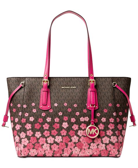 michael kors purses tan with flowers on it|Michael Kors see through purse.